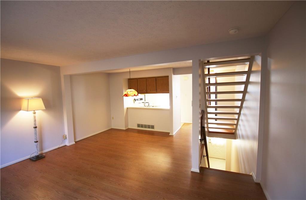 105 Rossmor Court Pittsburgh, PA 15229 - Photo 3 of 24 Living Room and Dining Area Looking Towards Kitchen