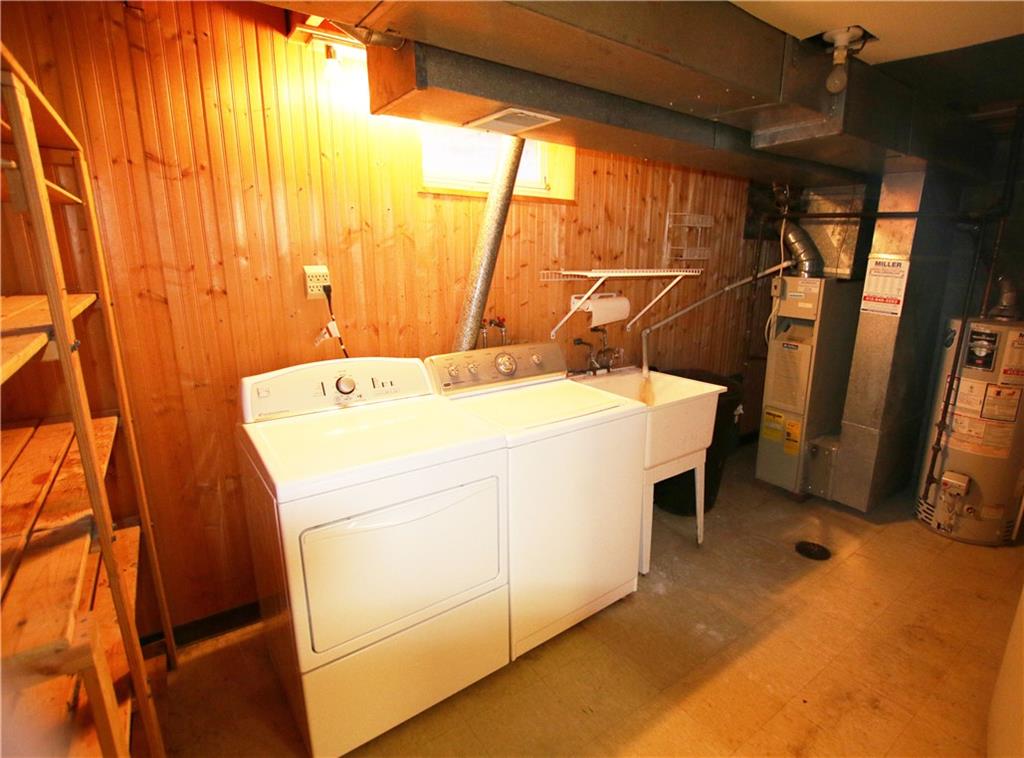105 Rossmor Court Pittsburgh, PA 15229 - Photo 21 of 24 Laundry Area With Furnace, Water Heater, and Storage