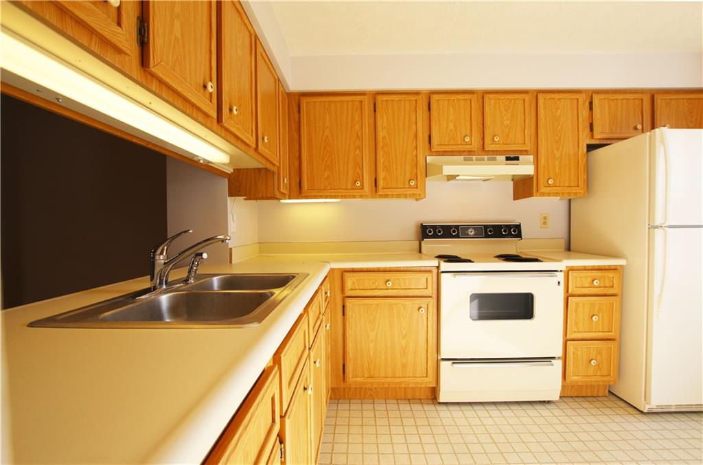 105 Rossmor Court Pittsburgh, PA 15229 - Photo 5 of 24 Kitchen With Pass-Through to Dining Area