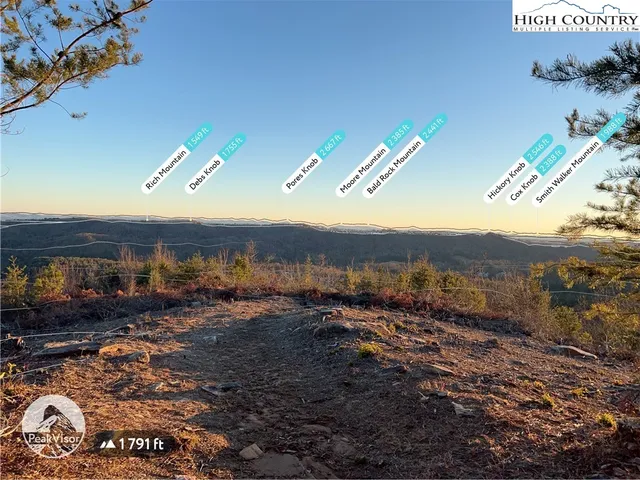a view of a lake with a mountain in the background