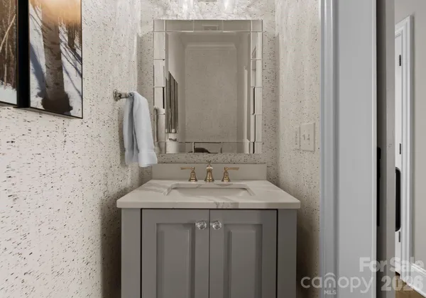 a bathroom with a sink a vanity and a mirror