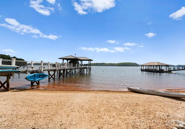 a view of a swimming pool and an outdoor seating