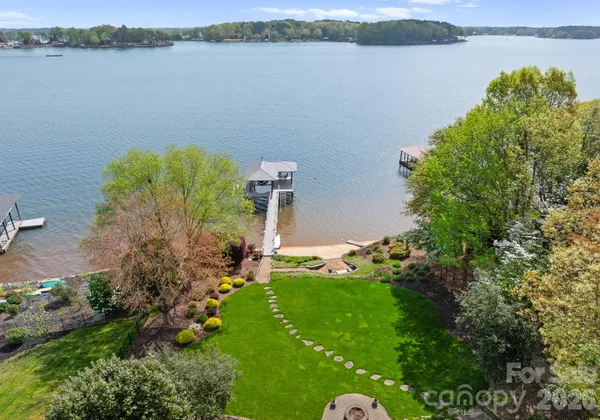a view of a lake with outdoor space and a lake view