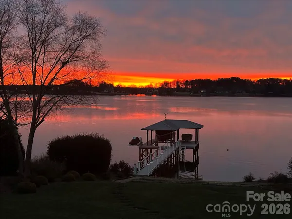 a view of a terrace with a lake view