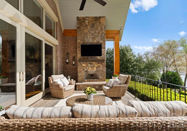 a view of balcony with furniture