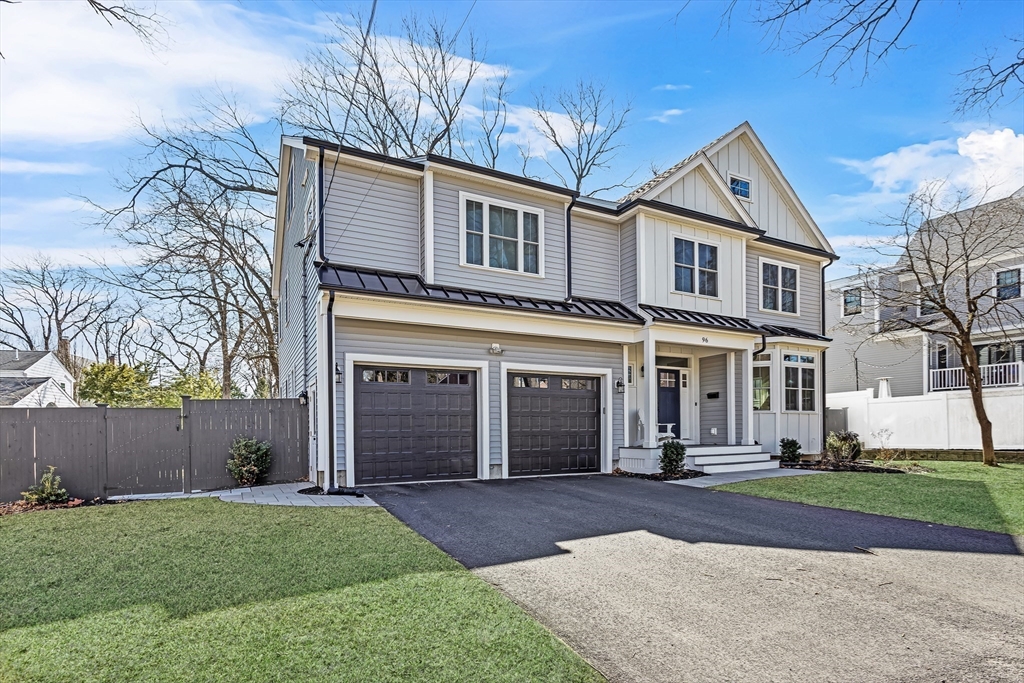 96 Winchester Road Arlington, MA 02474 - Photo 1 of 34 a front view of a house with a yard