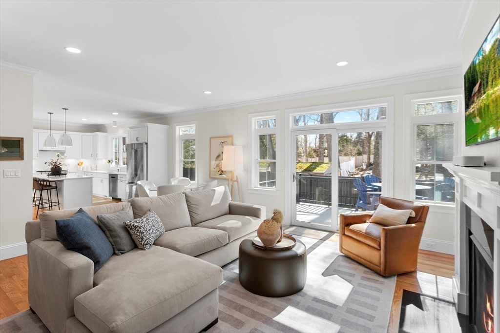 96 Winchester Road Arlington, MA 02474 - Photo 2 of 34 a living room with furniture and a large window