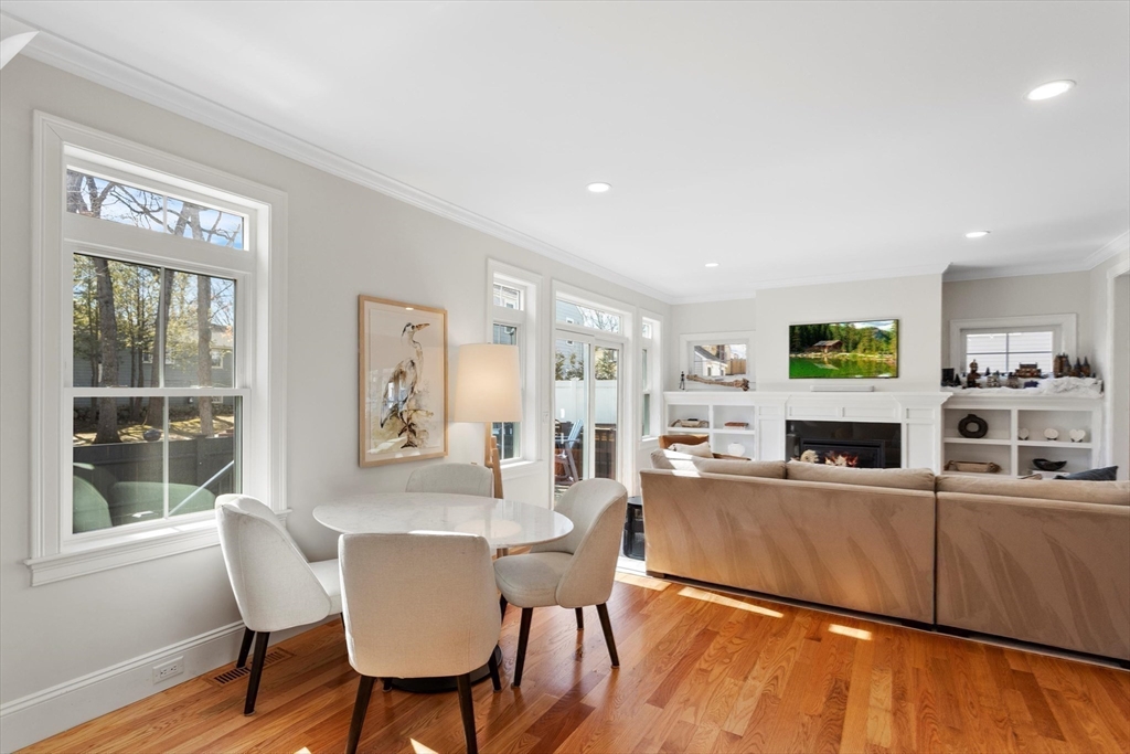 96 Winchester Road Arlington, MA 02474 - Photo 6 of 34 a view of a dining room with furniture window and wooden floor
