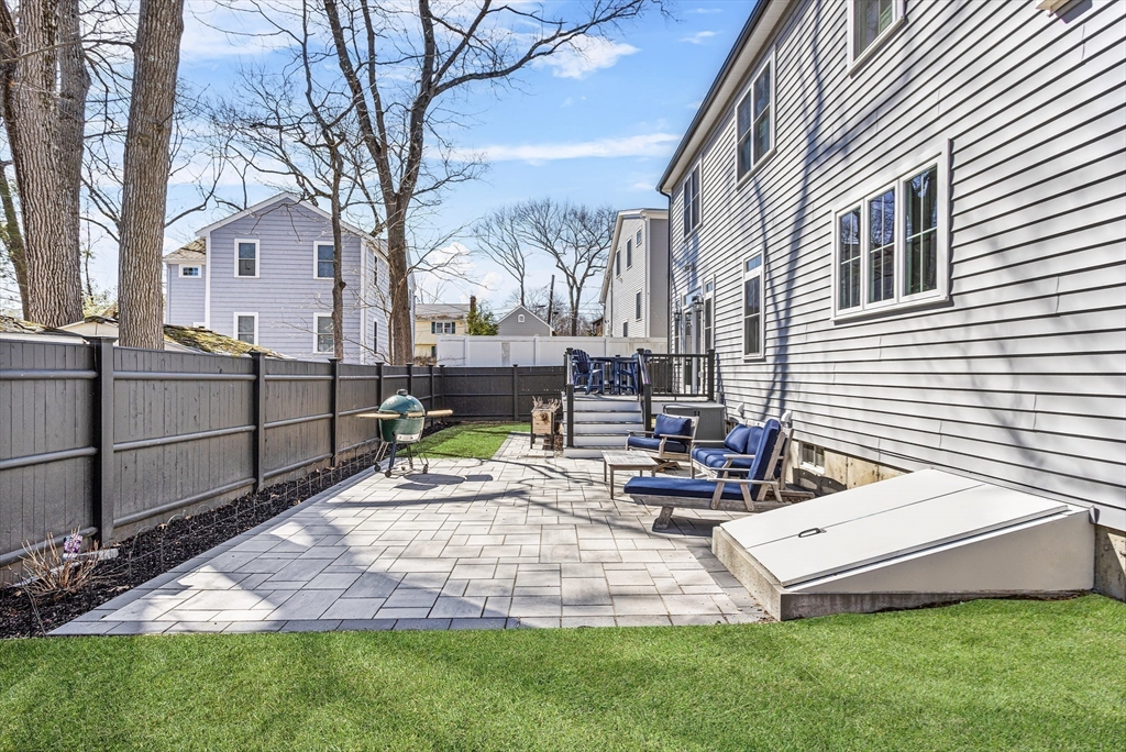 96 Winchester Road Arlington, MA 02474 - Photo 7 of 34 a view of backyard with sitting area