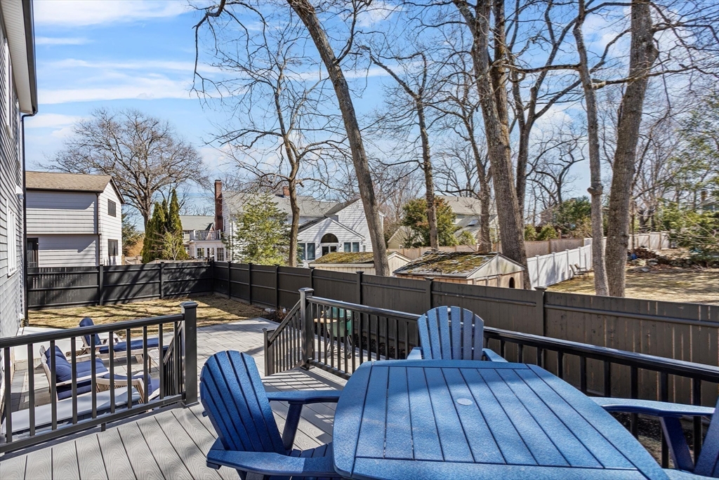 96 Winchester Road Arlington, MA 02474 - Photo 10 of 34 a view of balcony with wooden floor and outdoor seating