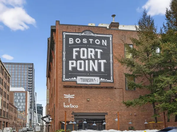 a sign that is on the wall of building