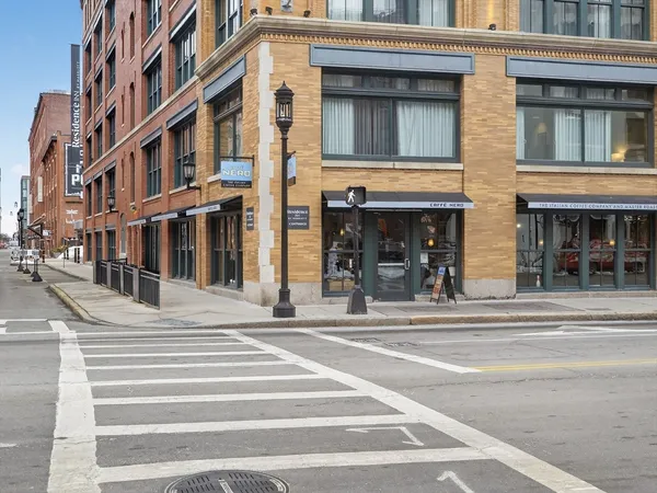 a view of a building on a street