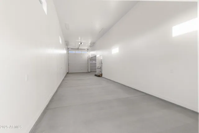 a view of kitchen with sink microwave and stove