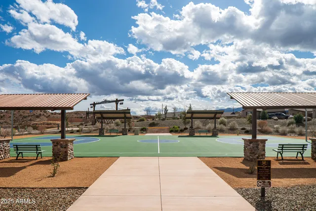 a view of a patio with swimming pool