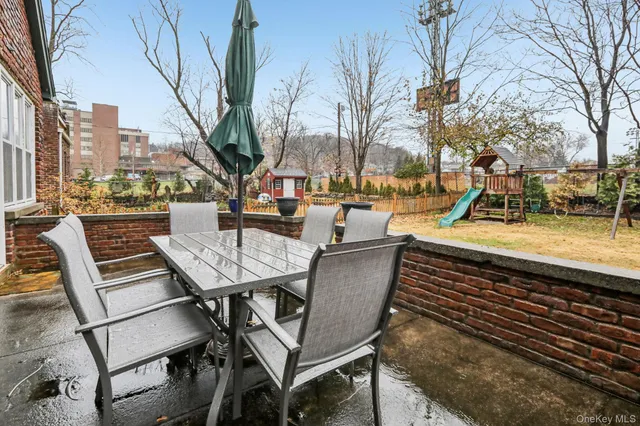 a view of outdoor space with garden and trees