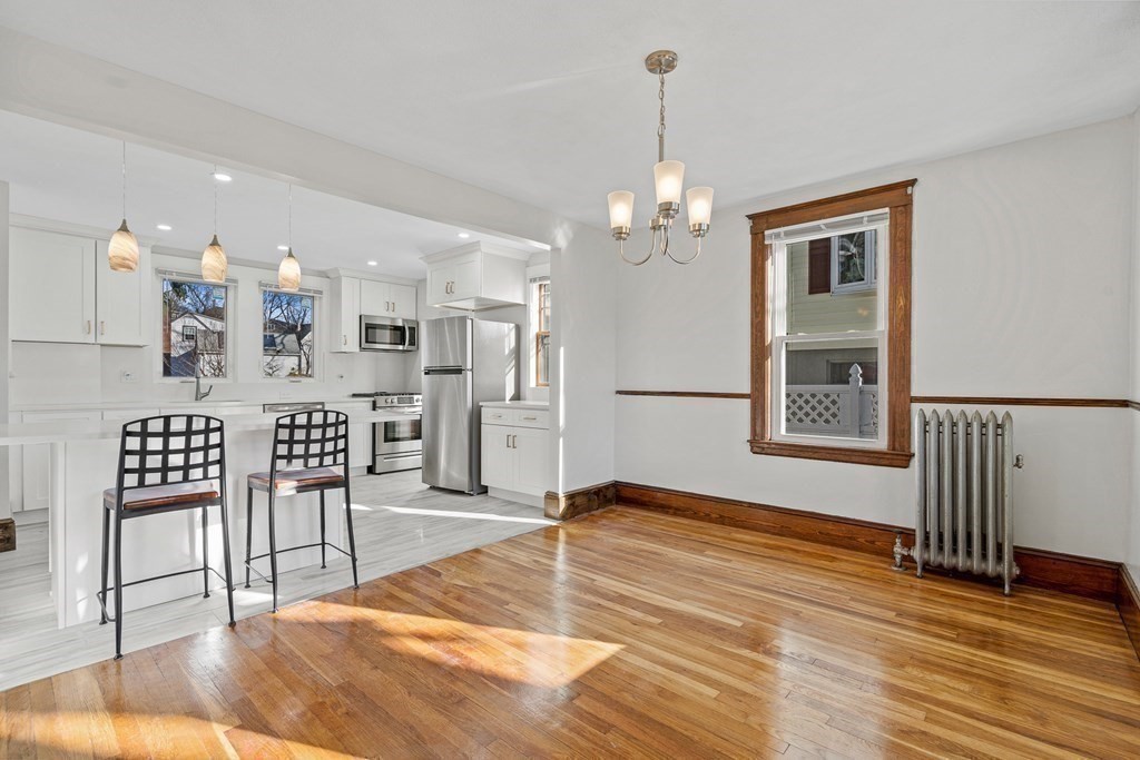 9 Upland Road Winchester, MA 01890 - Photo 11 of 42 a view of a kitchen and dining room