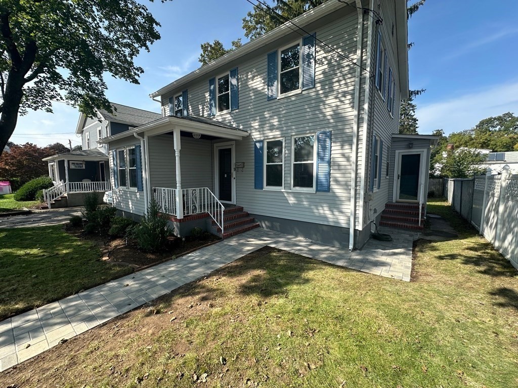 9 Upland Road Winchester, MA 01890 - Photo 5 of 42 a view of house with yard