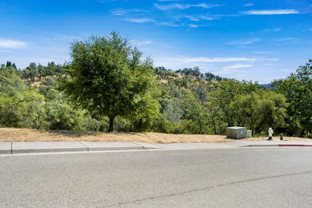 a view of street with houses