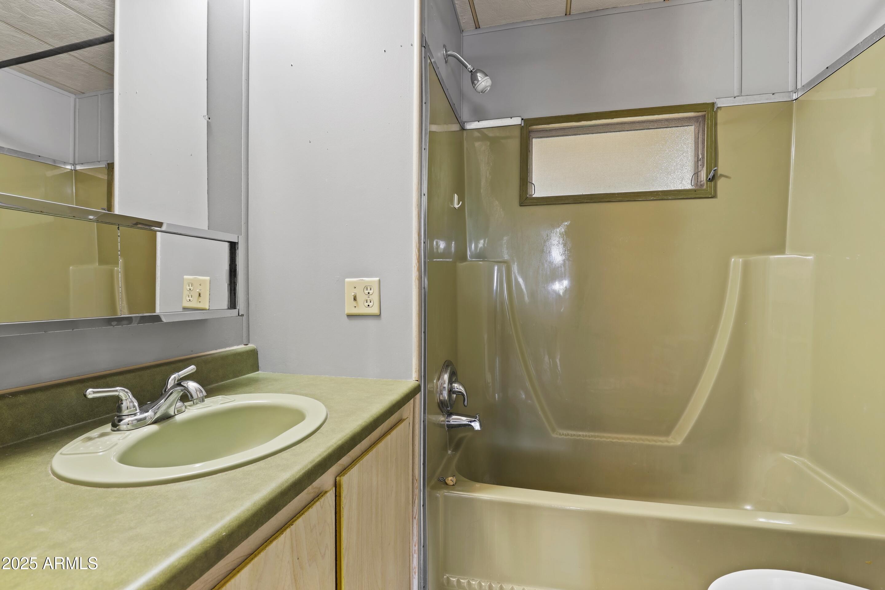 413 East Idle Circle Payson, AZ 85541 - Photo 15 of 24 a bathroom with a sink and a mirror