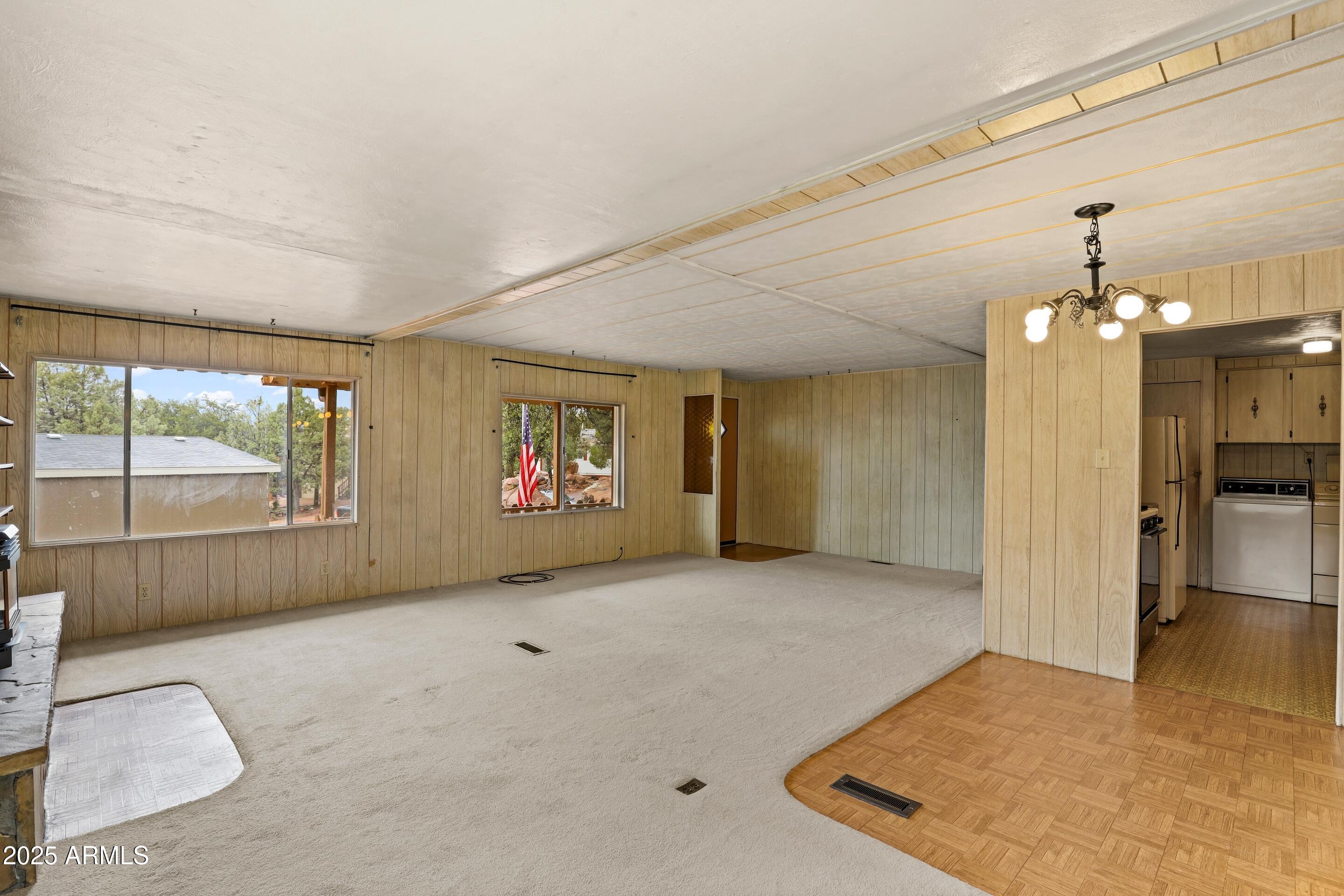 413 East Idle Circle Payson, AZ 85541 - Photo 5 of 24 en empty room with windows