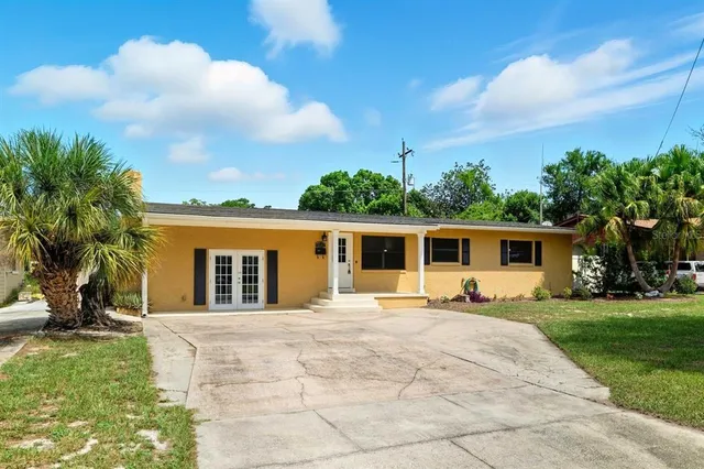 a house view with a garden space