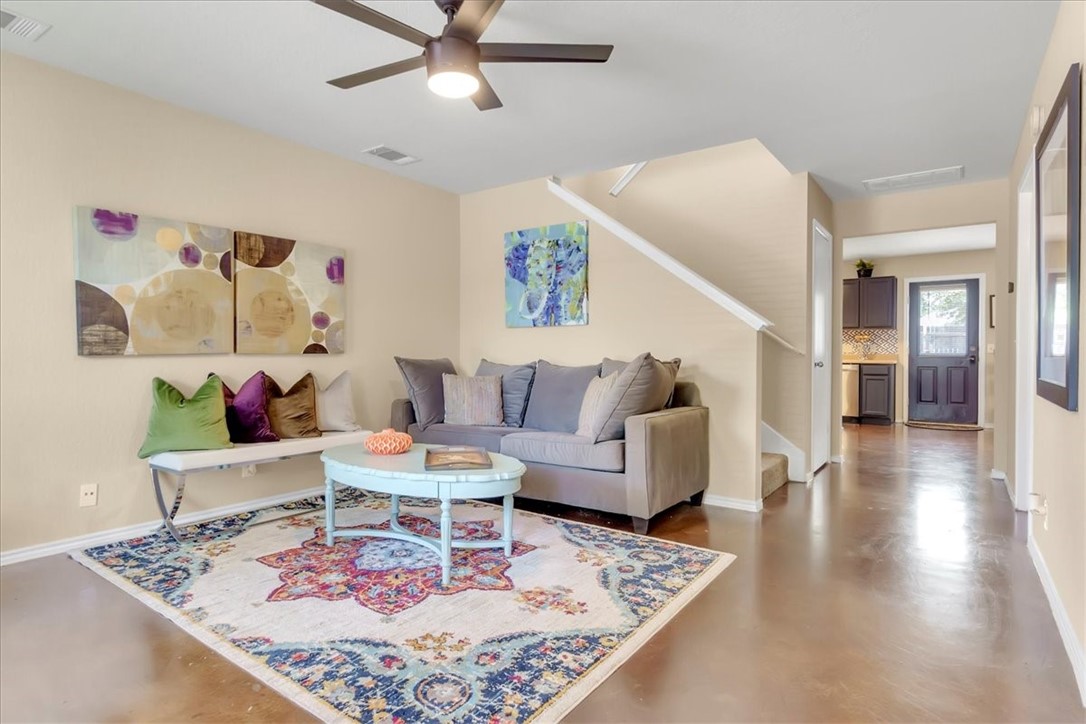 4529 Best Way Austin, TX 78725 - Photo 1 of 1 a living room with furniture and a rug