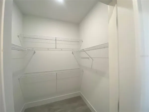 a view of a room with racks on the wall
