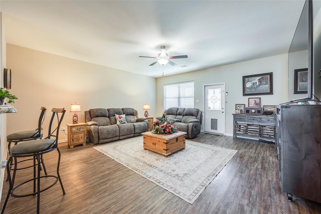 1832 Tyne Way Crowley, TX 76036 - Photo 11 of 25 a living room with furniture and wooden floor