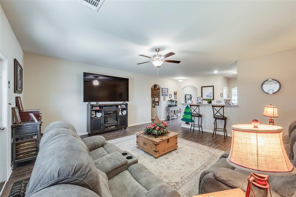 1832 Tyne Way Crowley, TX 76036 - Photo 13 of 25 a living room with furniture and a flat screen tv
