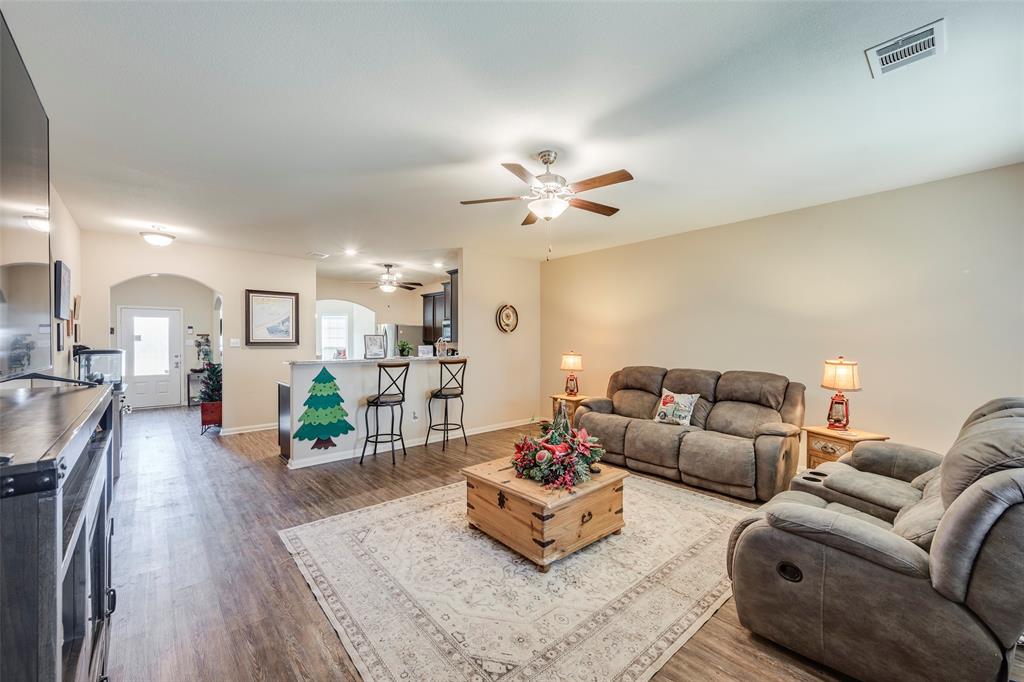 1832 Tyne Way Crowley, TX 76036 - Photo 14 of 25 a living room with furniture and a table