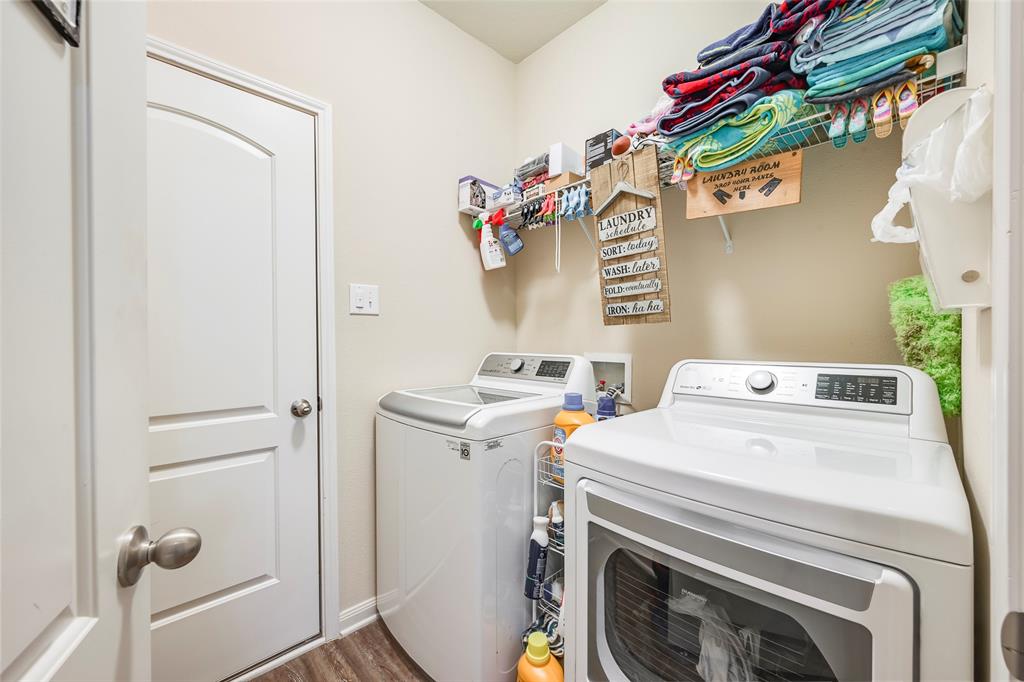1832 Tyne Way Crowley, TX 76036 - Photo 22 of 25 a utility room with dryer and washer