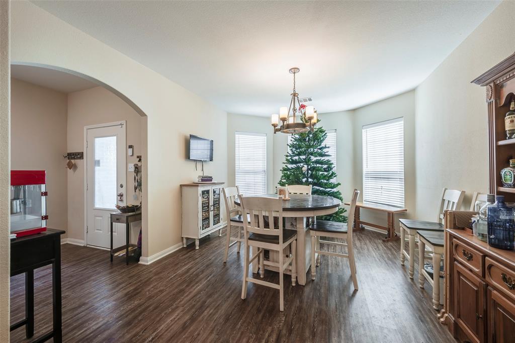 1832 Tyne Way Crowley, TX 76036 - Photo 3 of 25 a view of a dining room with furniture window and wooden floor