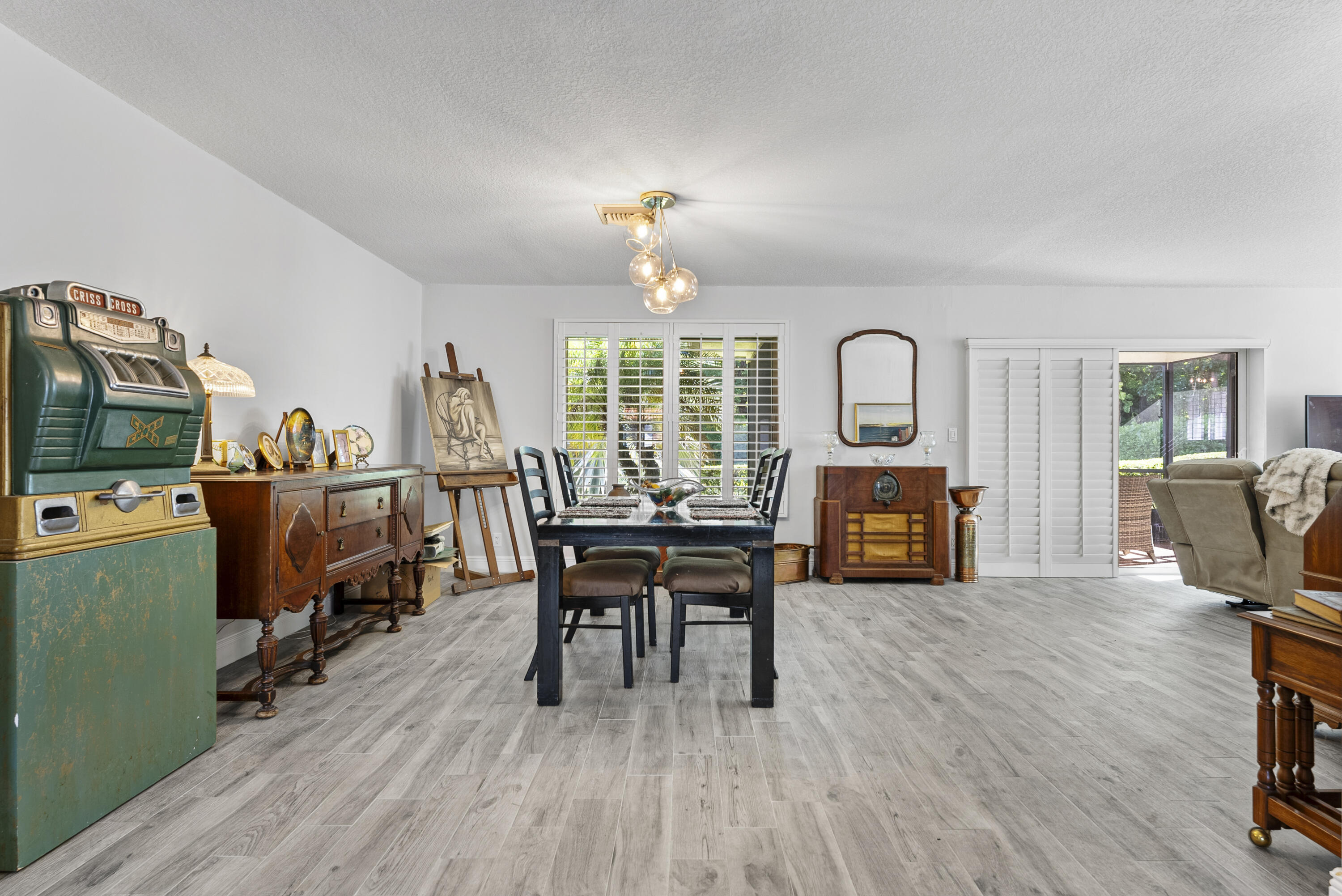 334 Northwest 42nd Street Boca Raton, FL 33431 - Photo 15 of 48 a workspace with furniture window and wooden floor