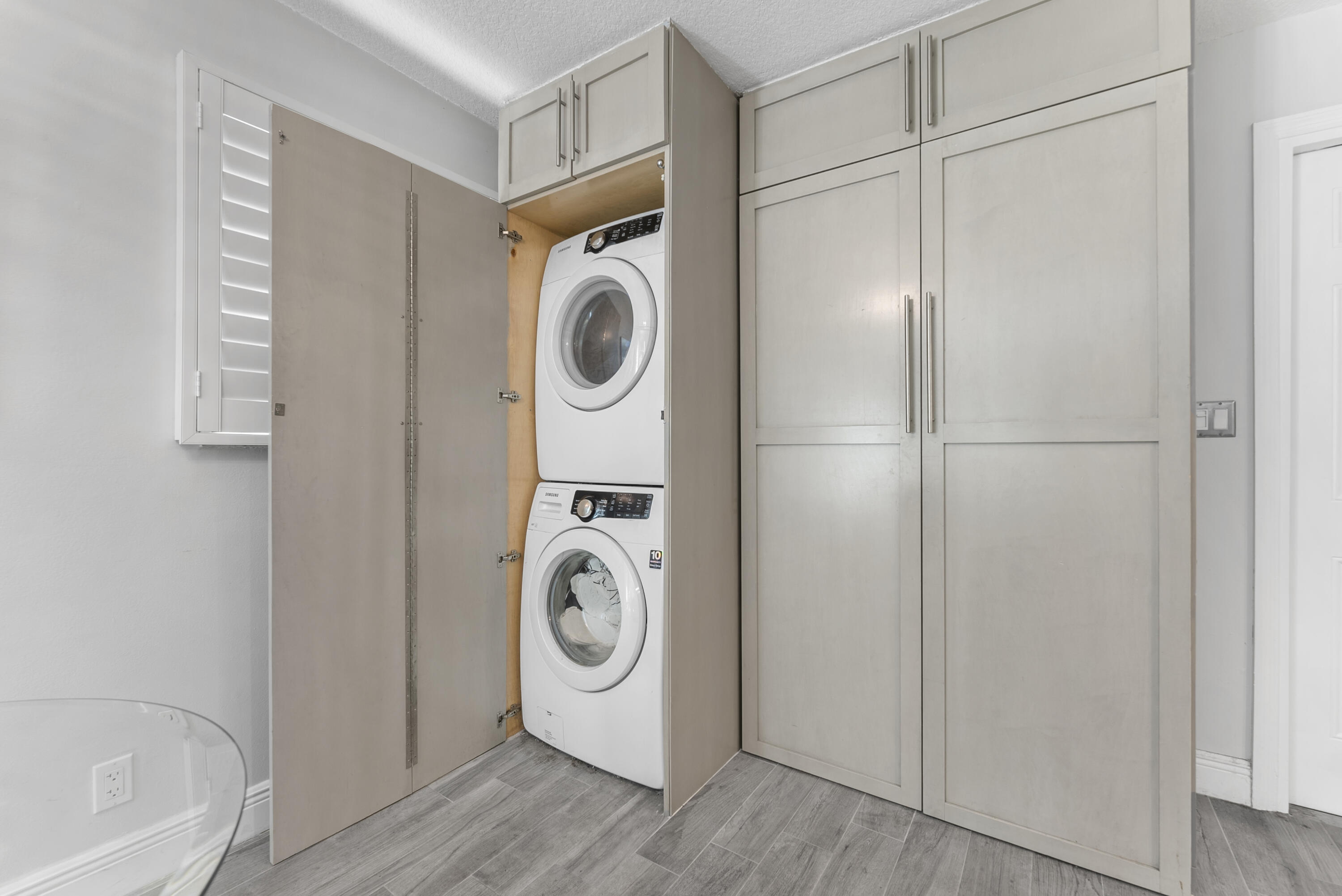 334 Northwest 42nd Street Boca Raton, FL 33431 - Photo 26 of 48 a utility room with dryer and washer