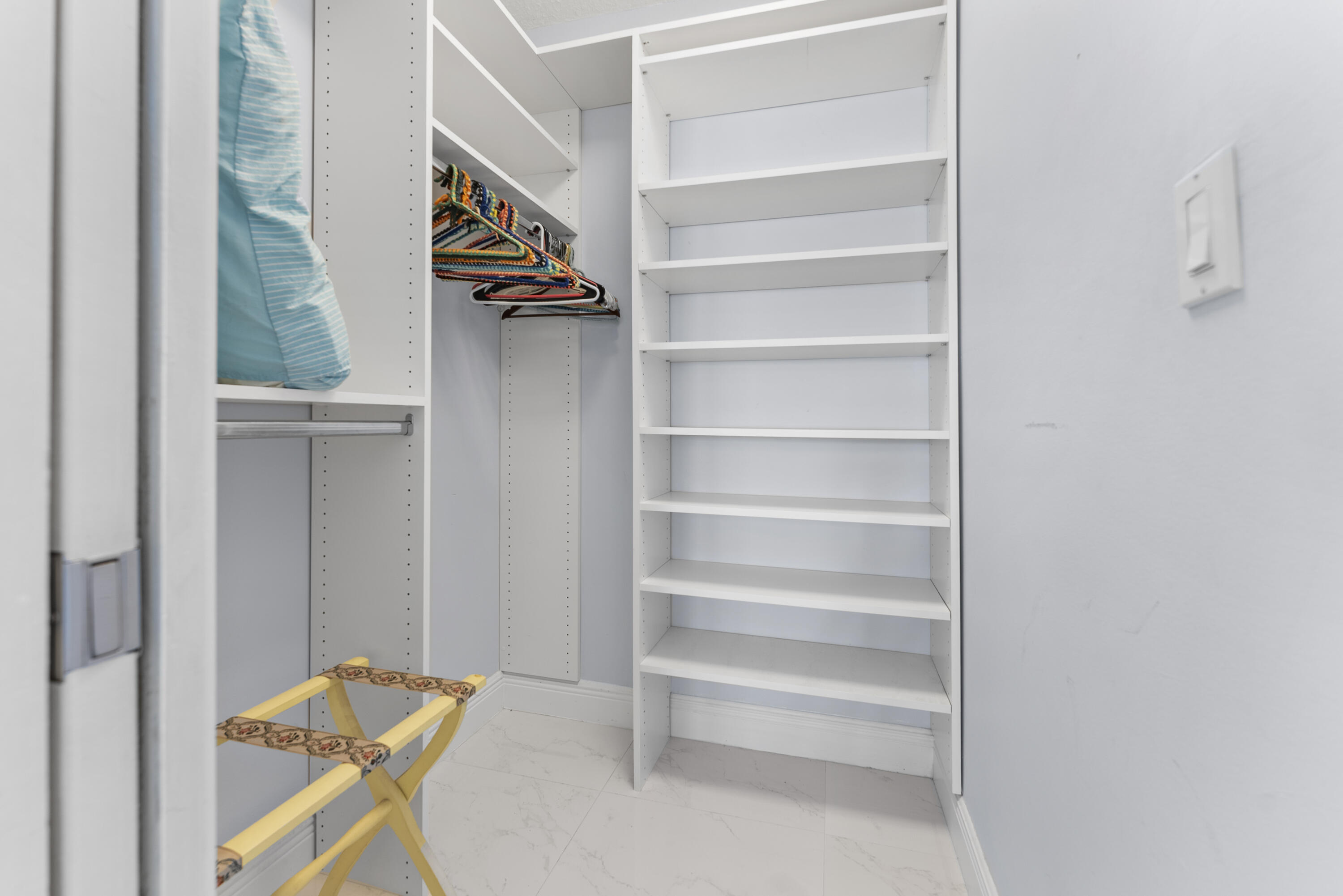 334 Northwest 42nd Street Boca Raton, FL 33431 - Photo 38 of 48 a view of walk in closet with empty racks