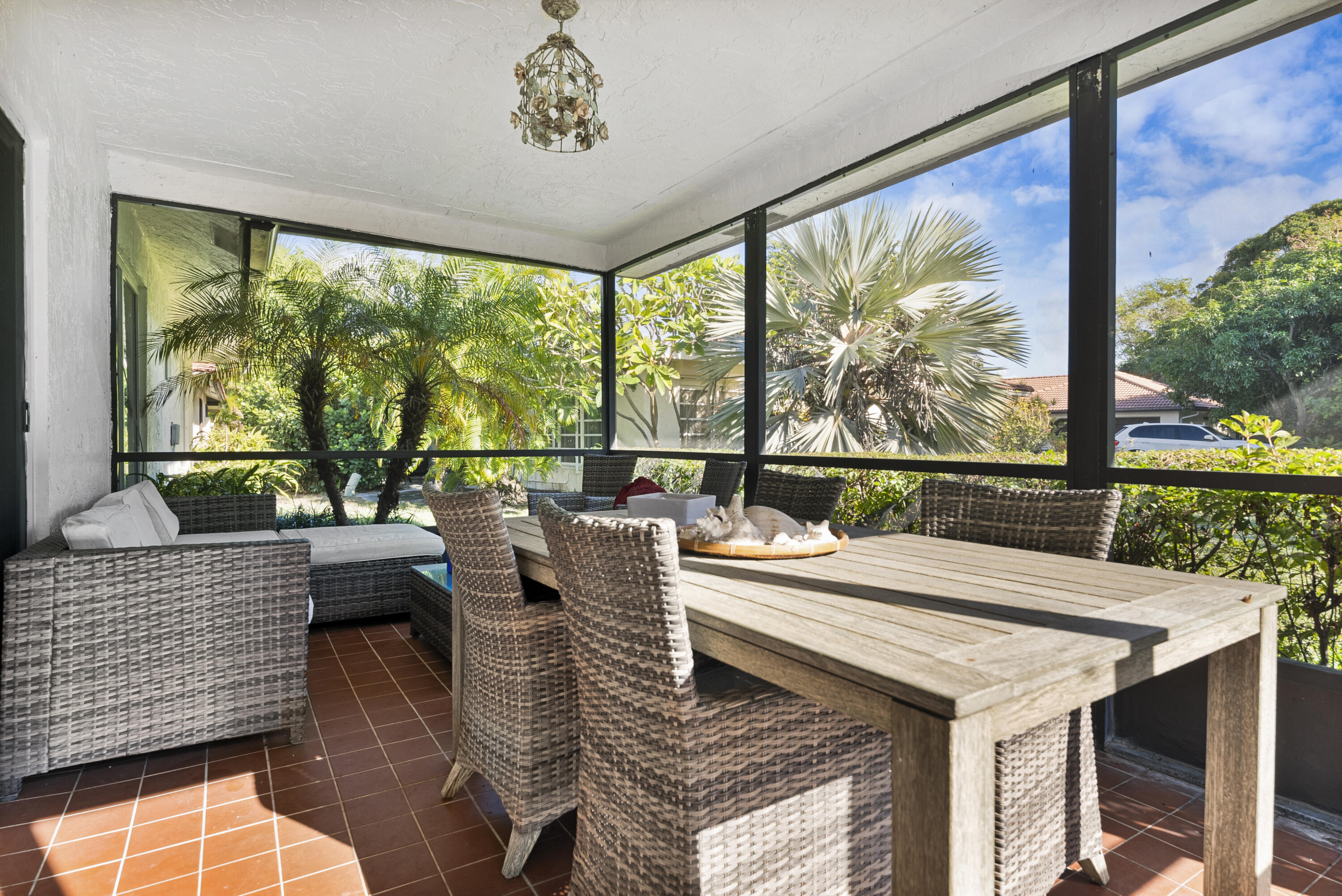 334 Northwest 42nd Street Boca Raton, FL 33431 - Photo 39 of 48 a view of a city from a dining room with large windows