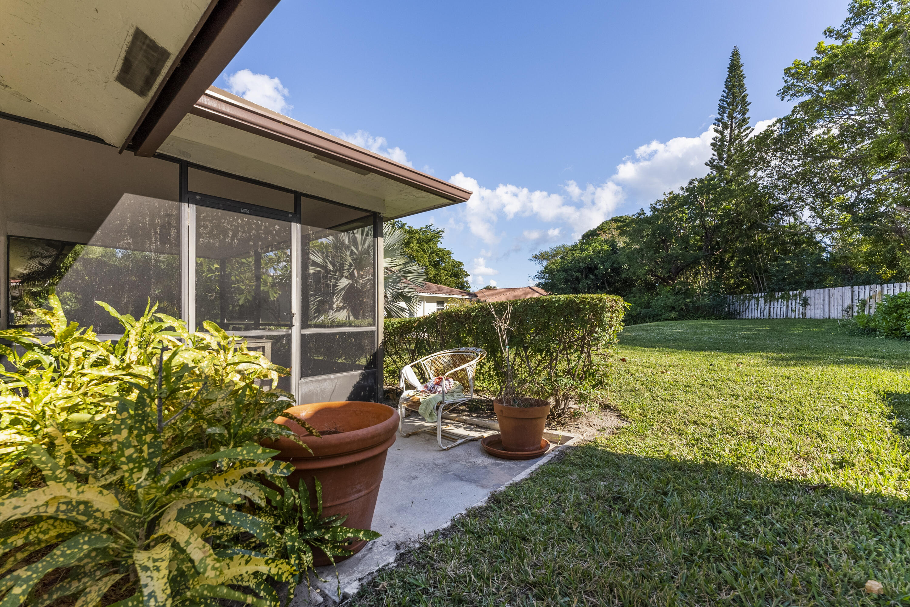 334 Northwest 42nd Street Boca Raton, FL 33431 - Photo 9 of 48 a view of a swimming pool with a patio