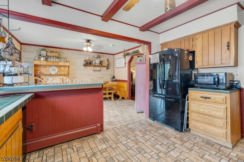 305 Wykertown Road Branchville, NJ 07826 - Photo 12 of 31 a storage room with cabinets