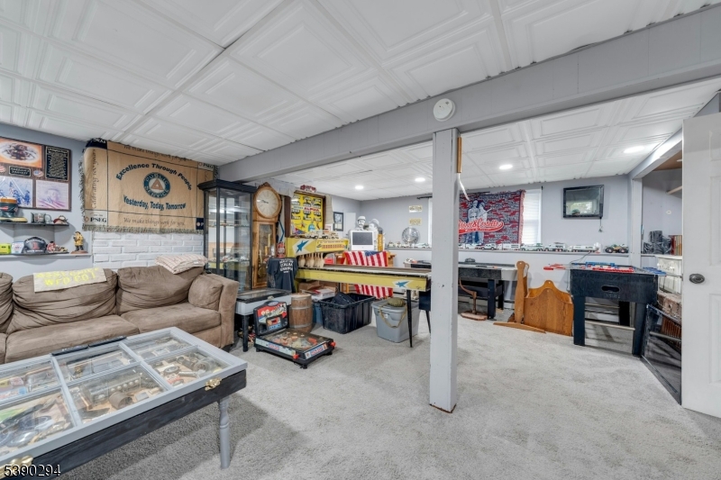 305 Wykertown Road Branchville, NJ 07826 - Photo 20 of 31 a living room with furniture and kitchen view