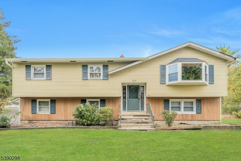 305 Wykertown Road Branchville, NJ 07826 - Photo 2 of 31 a front view of a house with a yard