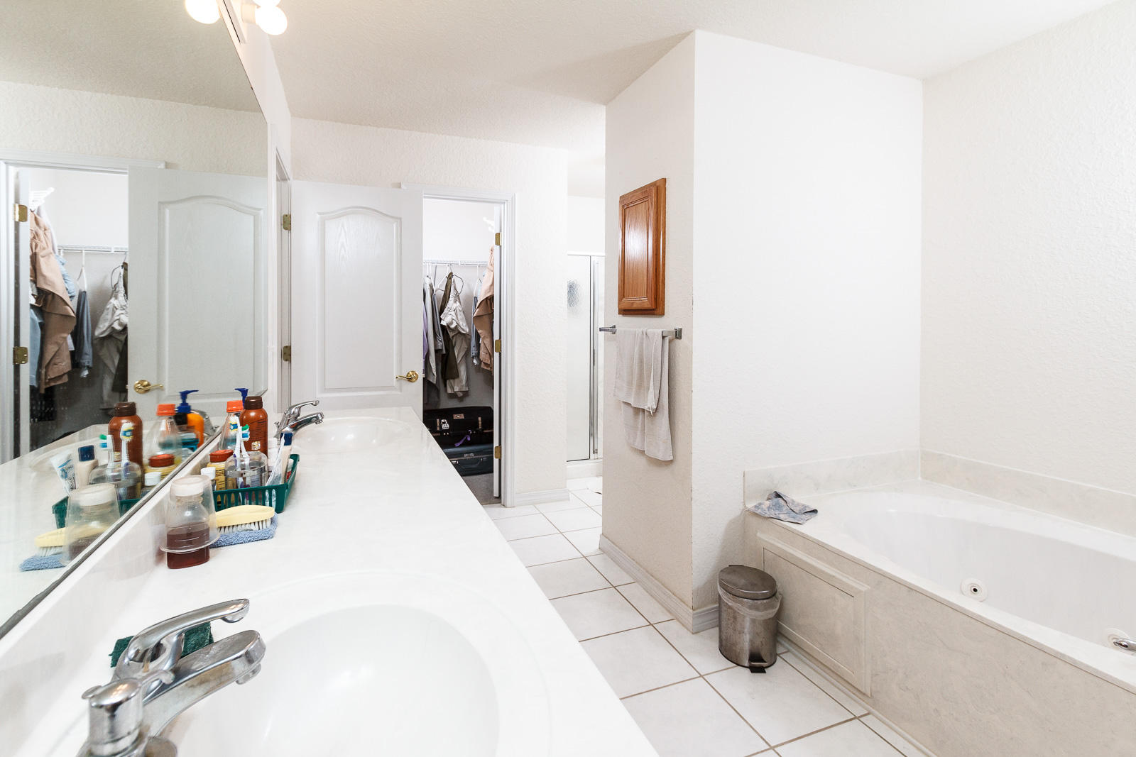 644 East Shipwreck Road Santa Rosa Beach, FL 32459 - Photo 22 of 41 a bathroom with a tub sink and a mirror