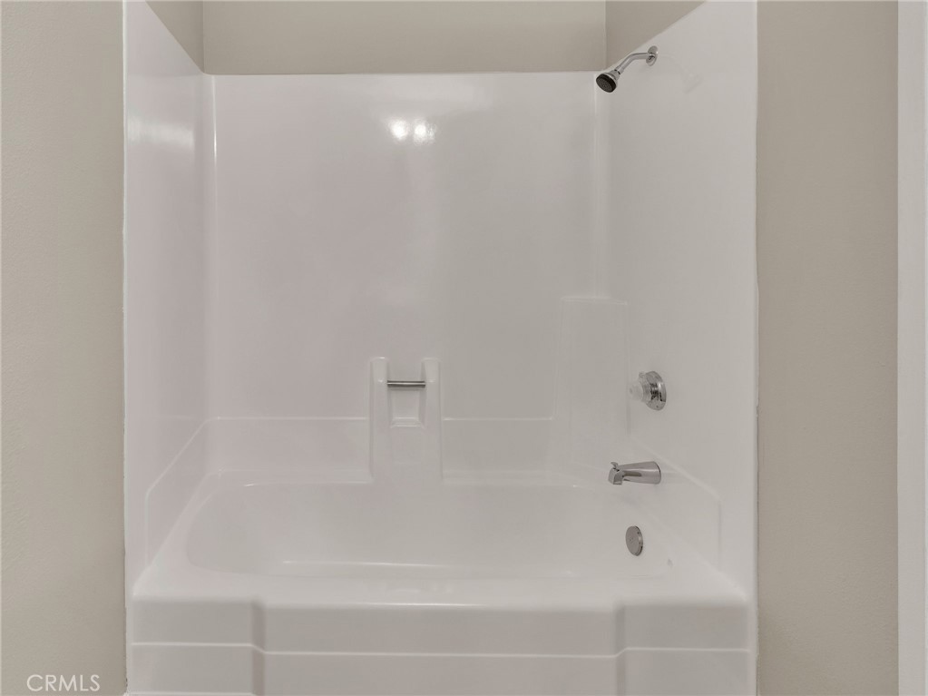 9404 Roundup Drive, Unit B Montclair, CA 91763 - Photo 15 of 37 a close up of a bathtub