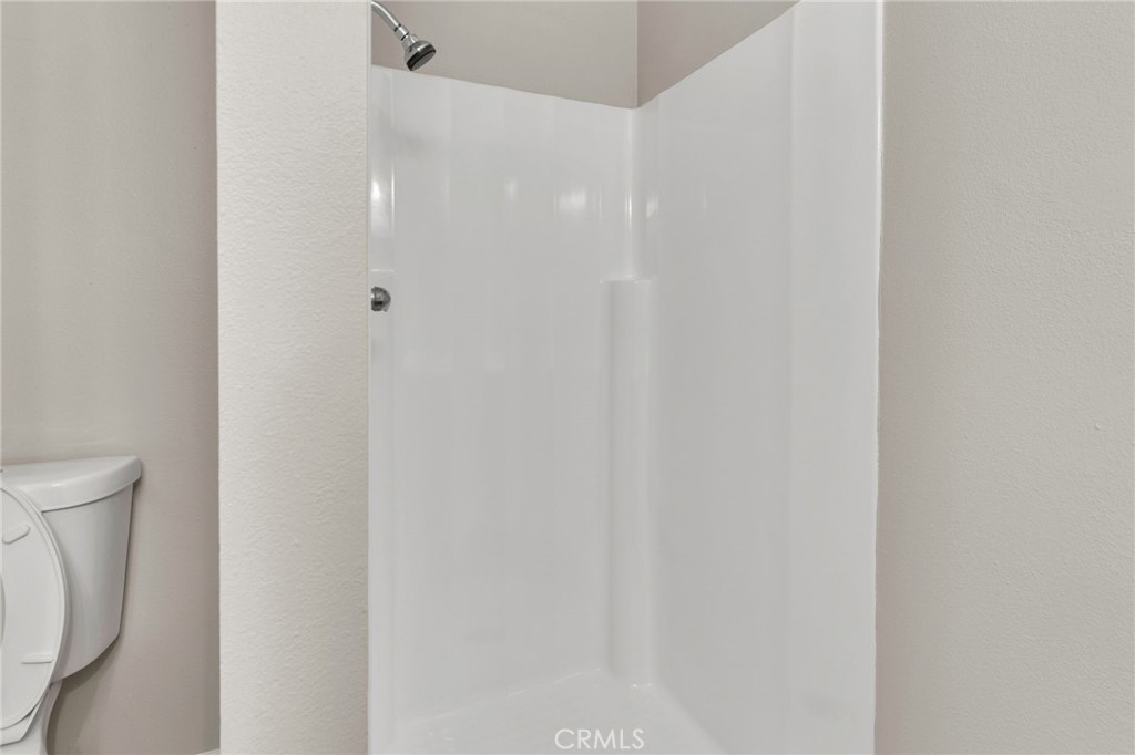 9404 Roundup Drive, Unit B Montclair, CA 91763 - Photo 24 of 37 a bathroom with a shower