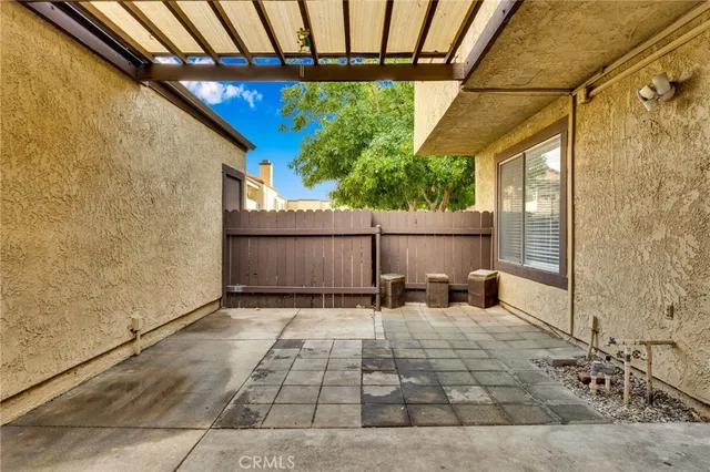 a backyard of a house with an outdoor space
