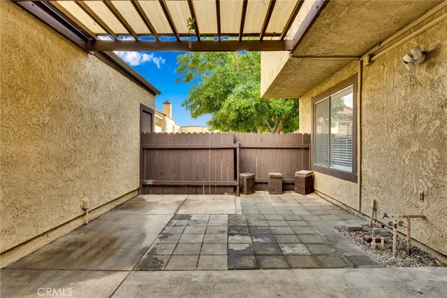 a backyard of a house with an outdoor space
