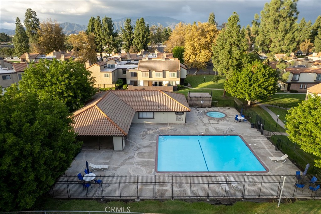 9404 Roundup Drive, Unit B Montclair, CA 91763 - Photo 34 of 37 a view of house with garden space and street view