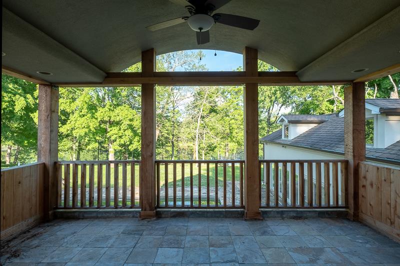 1041 South Rutland Road Mount Juliet, TN 37122 - Photo 12 of 17 Covered Patio Connected to Master Bedroom Overlooking Pool and Lake