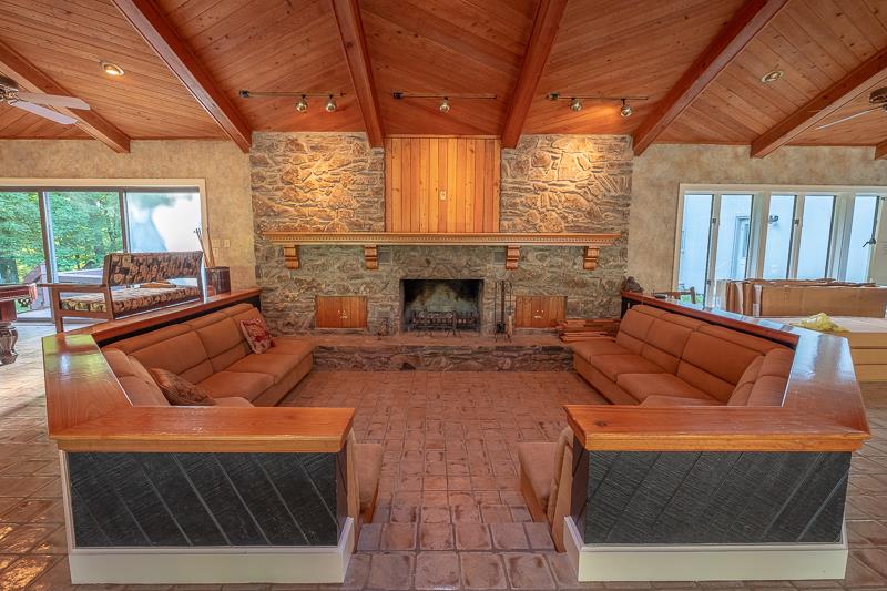 1041 South Rutland Road Mount Juliet, TN 37122 - Photo 9 of 17 Sunken Den with Stone Fireplace