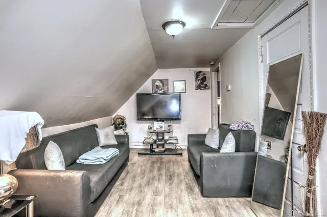 a kitchen with a sink a stove and cabinets