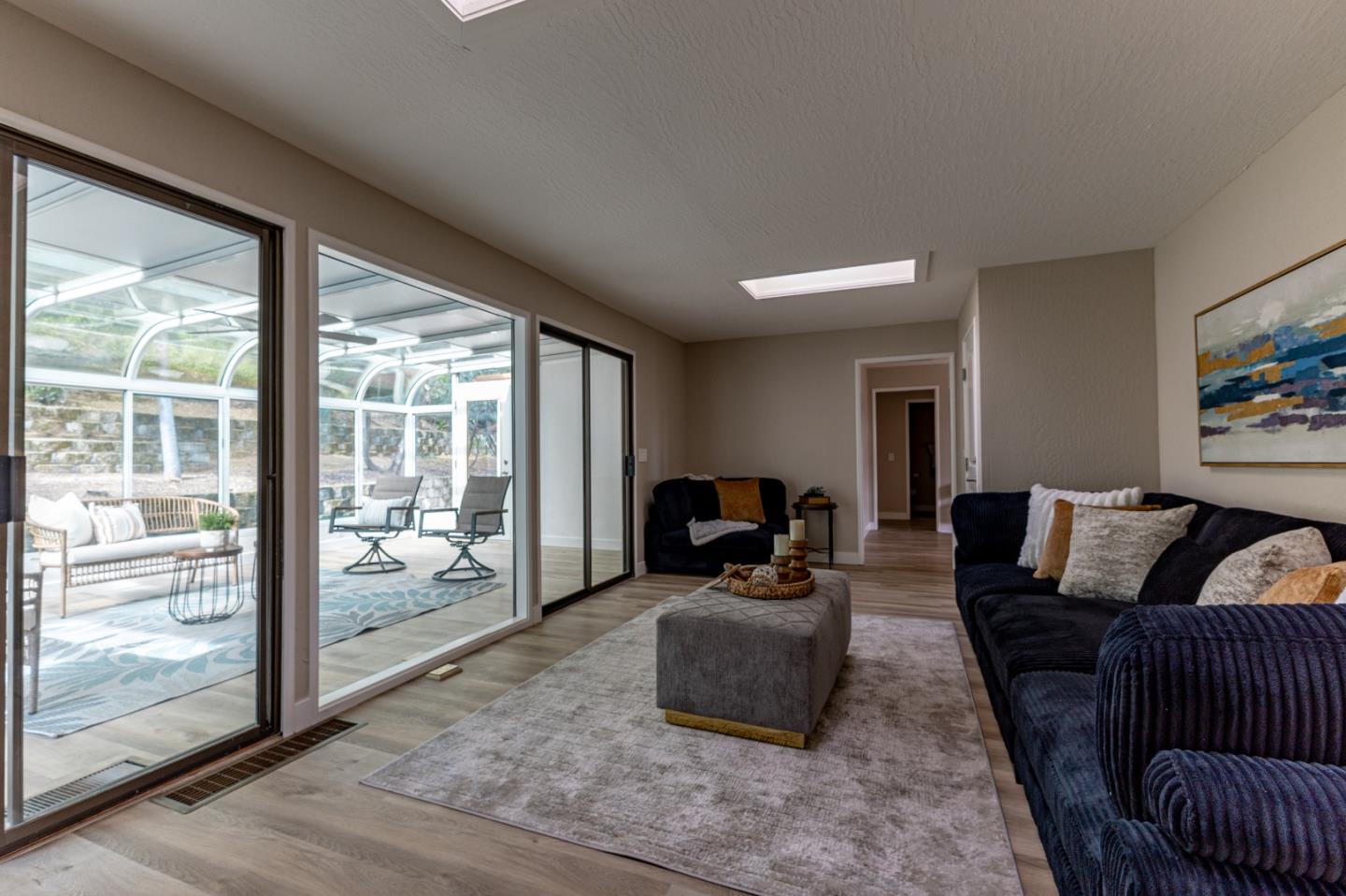 4030 St Marys Street Martinez, CA 94553 - Photo 11 of 28 a living room with furniture floor to ceiling window and a flat screen tv